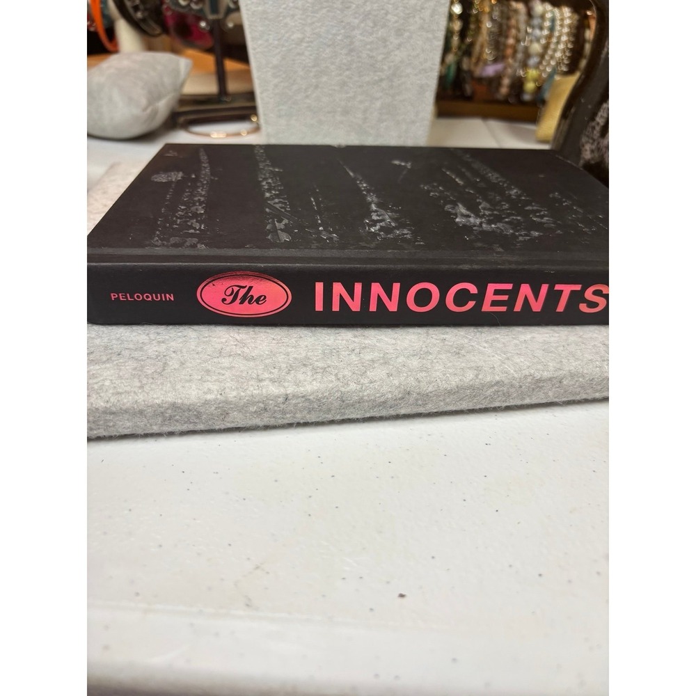 Peloquin "The Innocents" black hardcover book